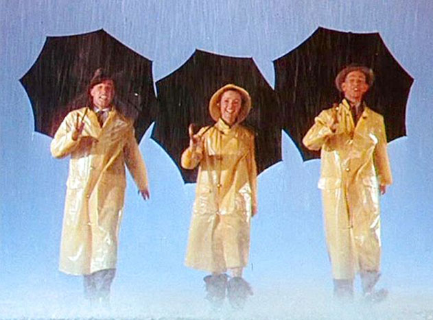 Gene Kelly, Debbie Reynolds, and Donald O'Connor in Kelly and Stanley Donen's *Singin' in the Rain*